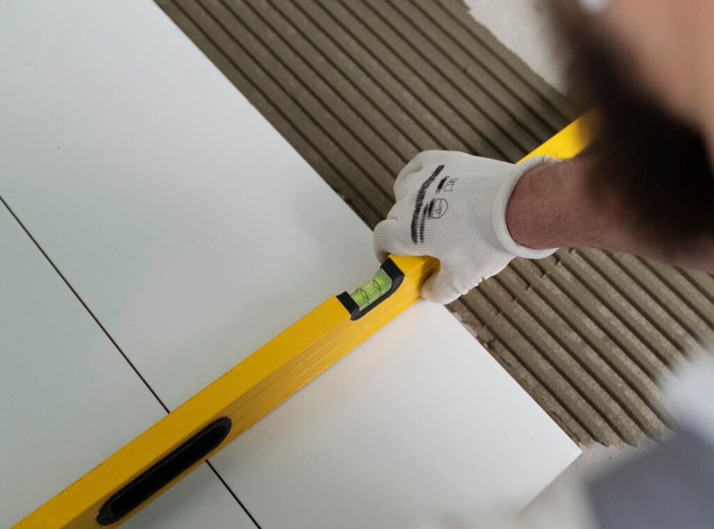 tiler working renovation apartment